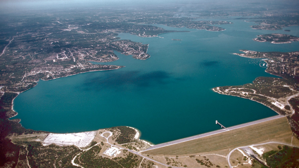 Aerial view of Canyon Lake and dam in the Texas Hill Country at golden hour